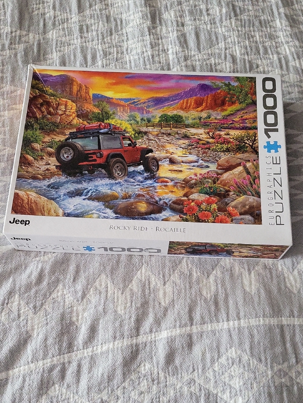Jeep Red SUV Crossing a Colorful River Valley Puzzle Box